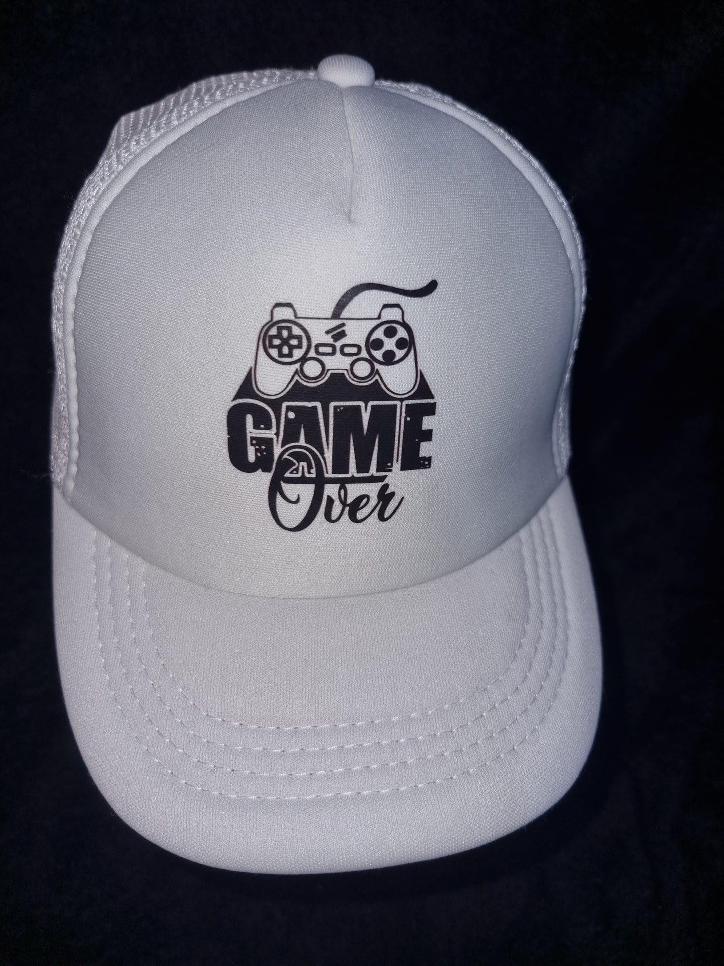 Children's game over baseball cap