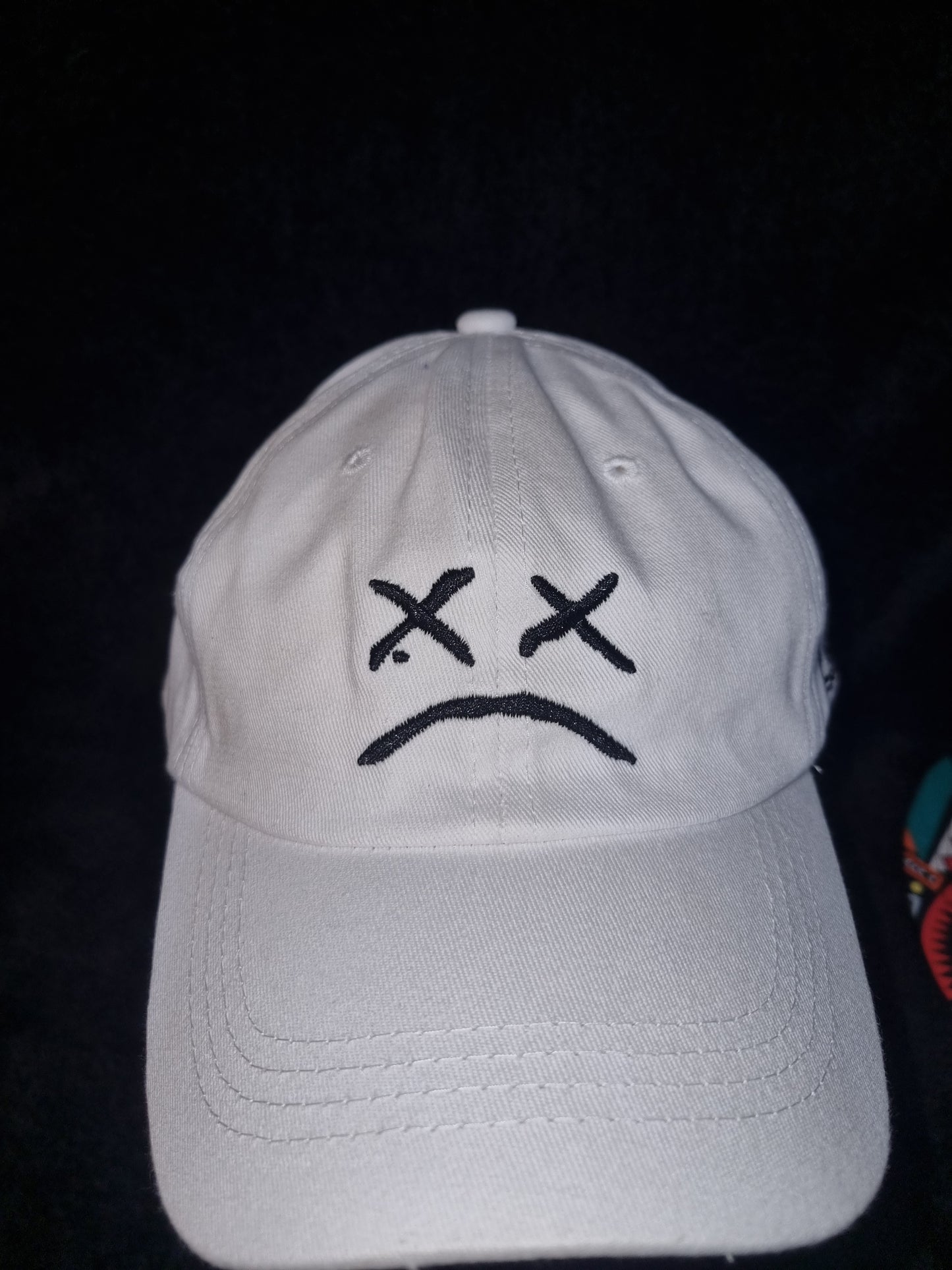 Adults white baseball cap with sad face