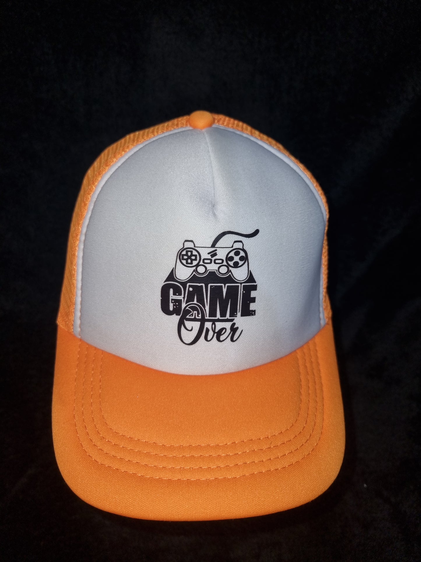 Children's game over baseball cap
