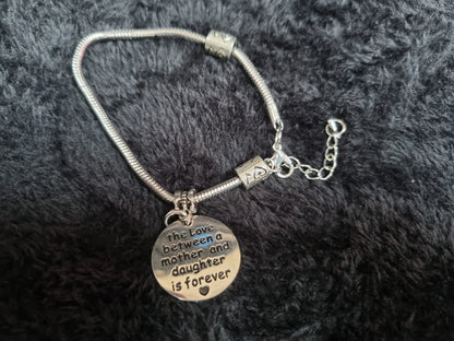The love between a mother and daughter... charm bracelet