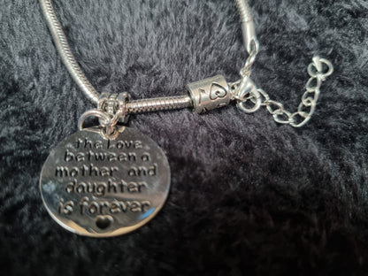 The love between a mother and daughter... charm bracelet